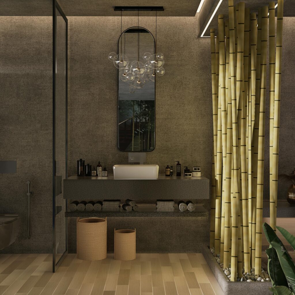 Stylish bathroom featuring bamboo plants, chic sink, and modern lighting.
